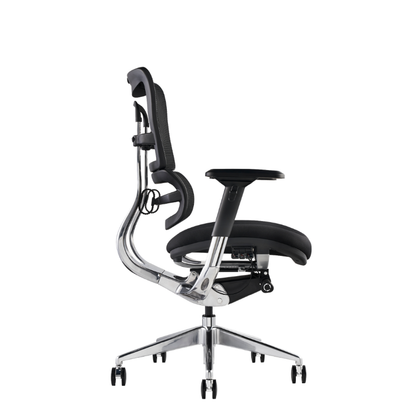 i29 a modern ergonomic office chair with a black mesh backrest, padded seat and armrests, and a curved chrome metal frame on a five-star wheeled base, view from the side.