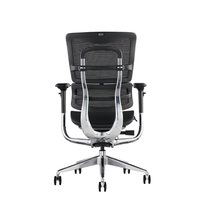 A modern black mesh office chair with a chrome-finished metal frame and five-wheel base, shown from the rear.